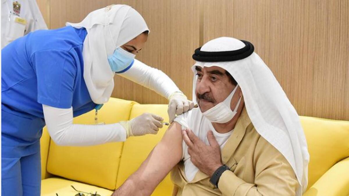 Sheikh Saud bin Rashid Al Mu'alla receives the vaccine.