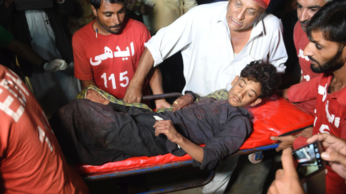 At least 50 dead, 100 injured in Pakistan shrine bombing