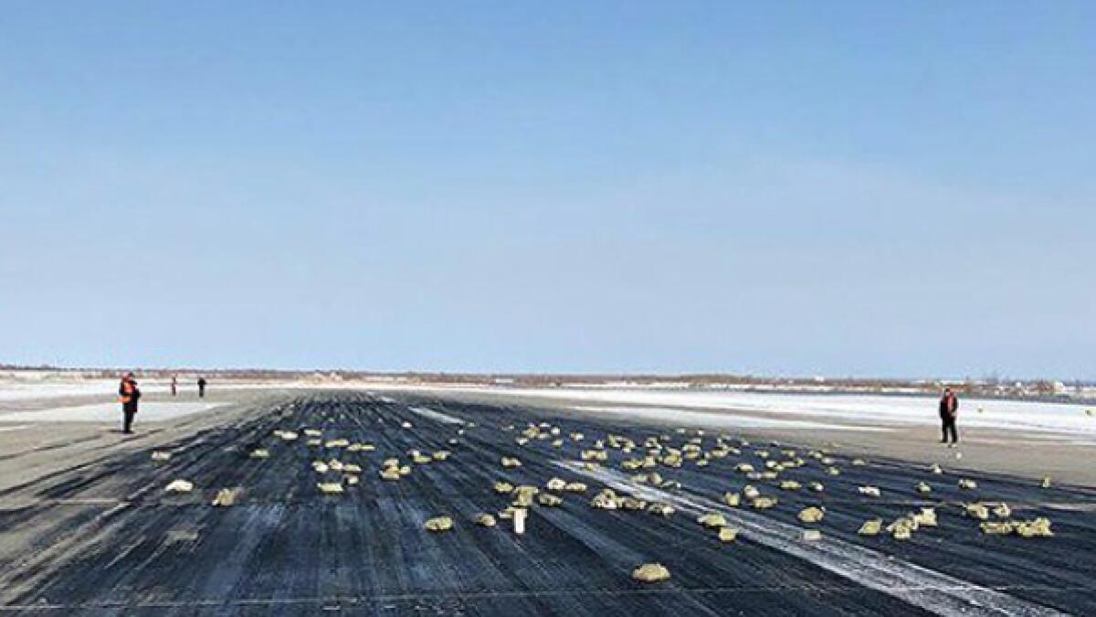 Video: 3 tonnes of gold spills all over runway