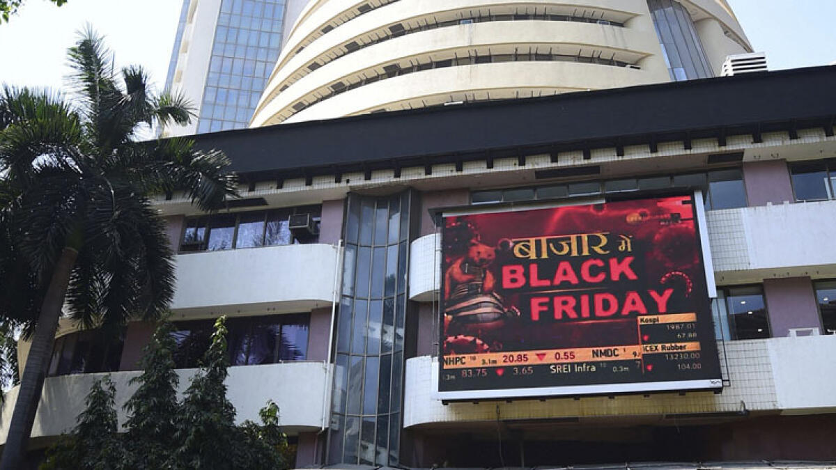 View of the  BSE building with a screen written Black Friday, as the Sensex plunged by 1,448 points, in Mumbai on Friday. - PTI