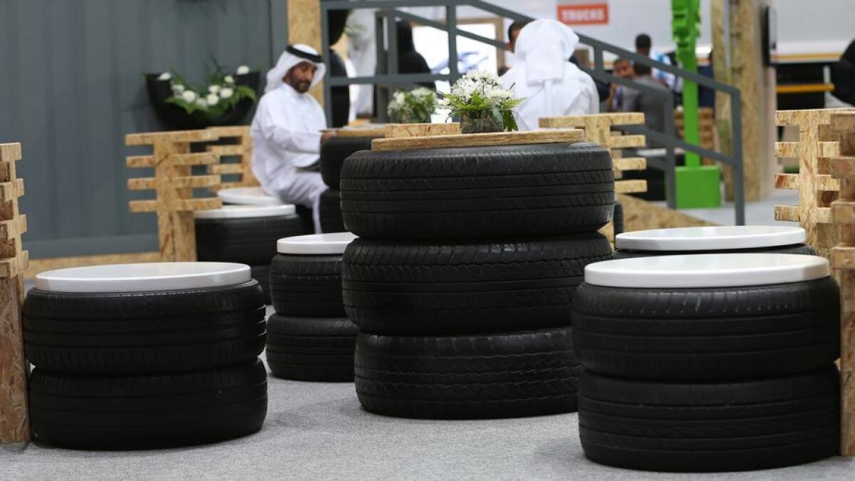 Tadweer showcases a model of used tyres recycled into chairs and tables at their pavilion.