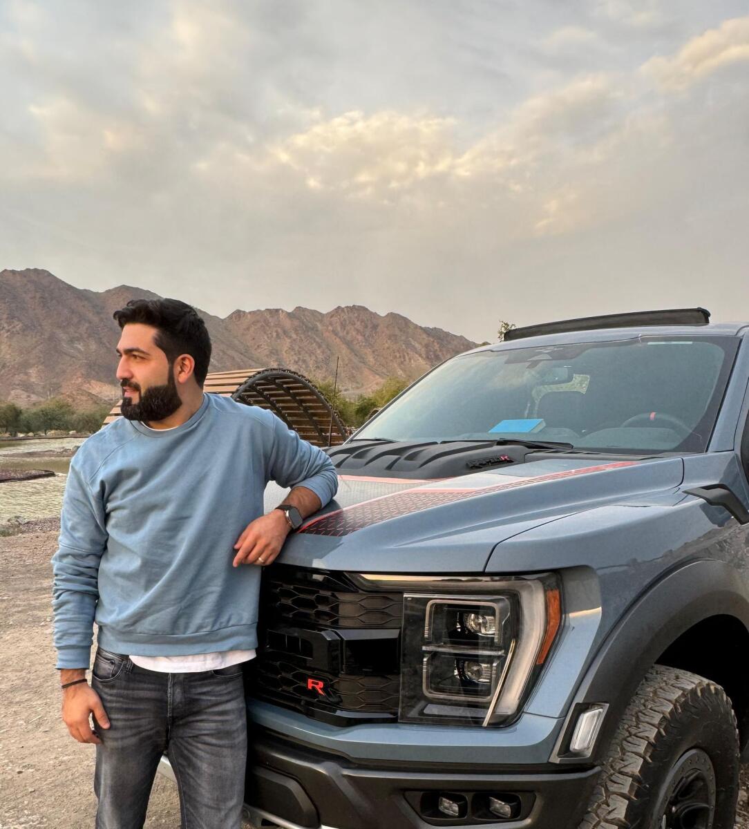 Ahmad Darwish Ali Al Emadi with his truck