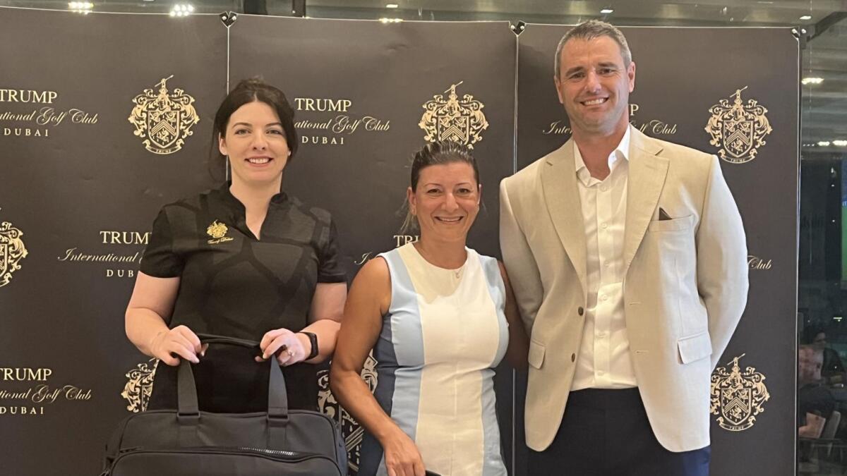 Winners of the floodlit tournament, left to right, Laura Conneely and Serene Salloum with Phil Waine, General Manager of Trump International Golf Club, Dubai. - Supplied photo