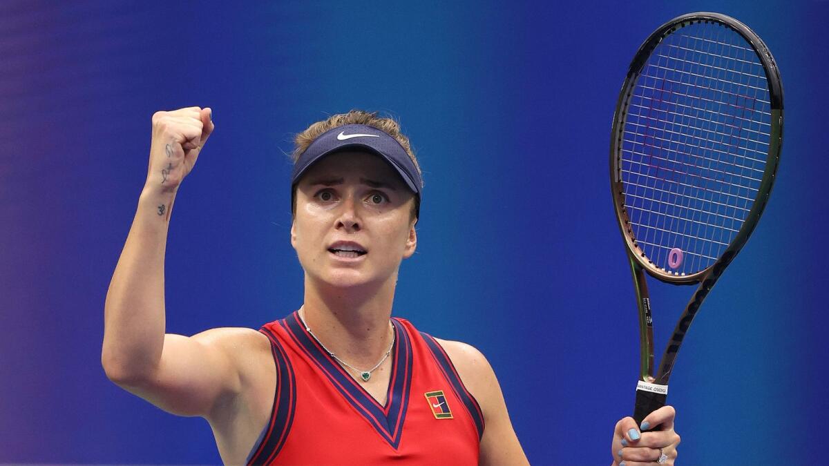 Elina Svitolina of Ukraine reacts against Simona Halep of Romania during their Women's singles match. — AFP