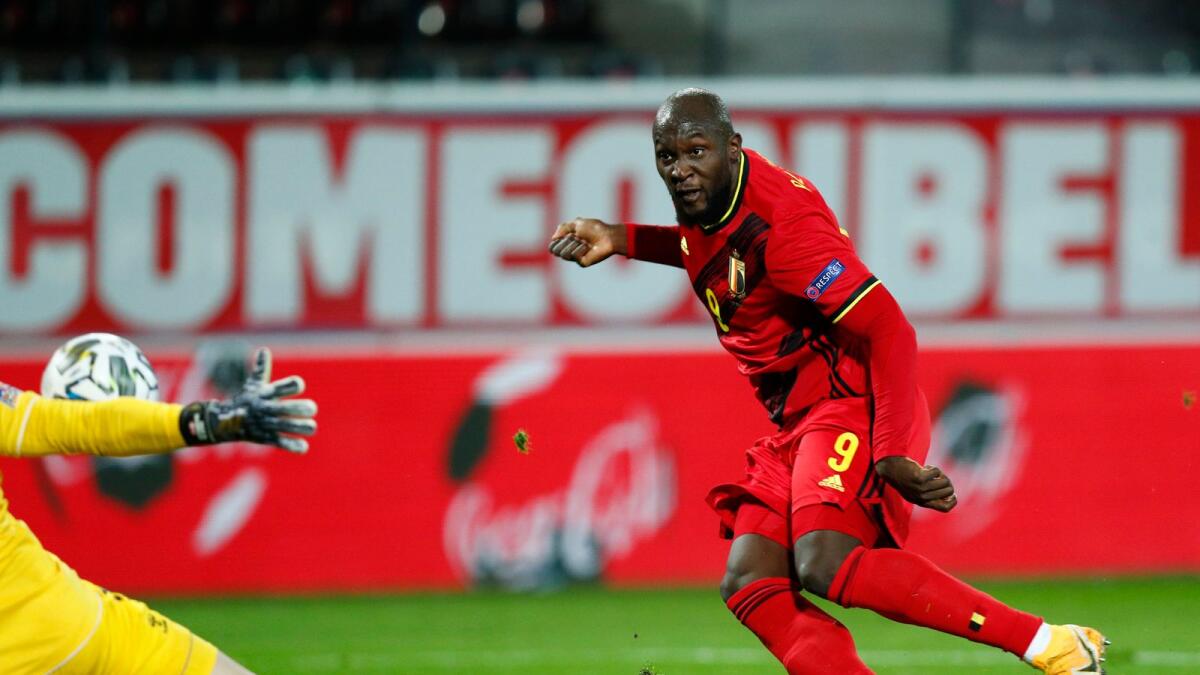 Romelu Lukaku scores Belgium's second goal in their 4-2 win over Denmark.
