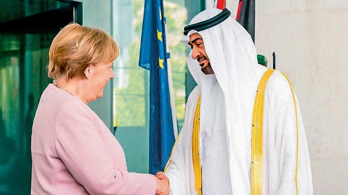 His Highness Sheikh Mohamed bin Zayed Al Nahyan being greeted by German Chancellor Angela Merkel in Berlin. — Courtesy: @MohamedBinZayed (Twitter)