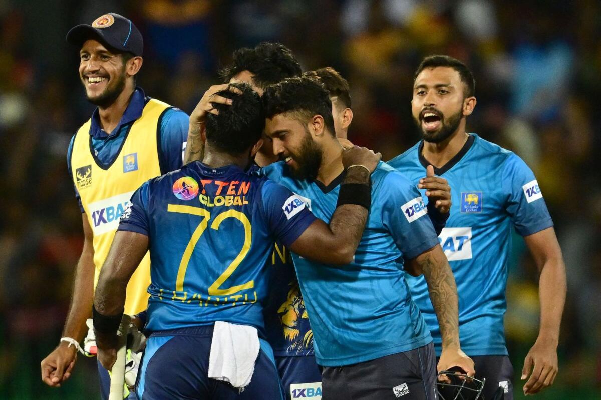 Sri Lanka's Charith Asalanka (2nd L) Kusal Mendis (2nd R) and teammates celebrates after Sri Lanka won by 2 wickets during the Asia Cup 2023 Super Four one-day international (ODI) cricket match between Sri Lanka and Pakistan at the R. Premadasa Stadium in Colombo early September 15, 2023. Photo: AFP