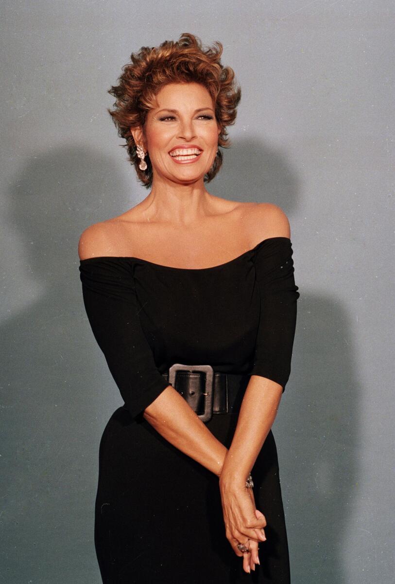 Raquel Welch poses backstage at the Emmy Awards in Los Angeles on Sept. 20, 1987