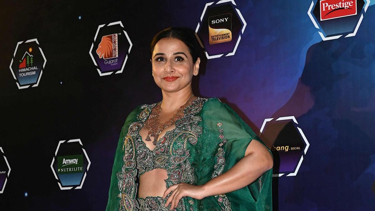 Bollywood actress Vidya Balan looks elegant in green at the awards night