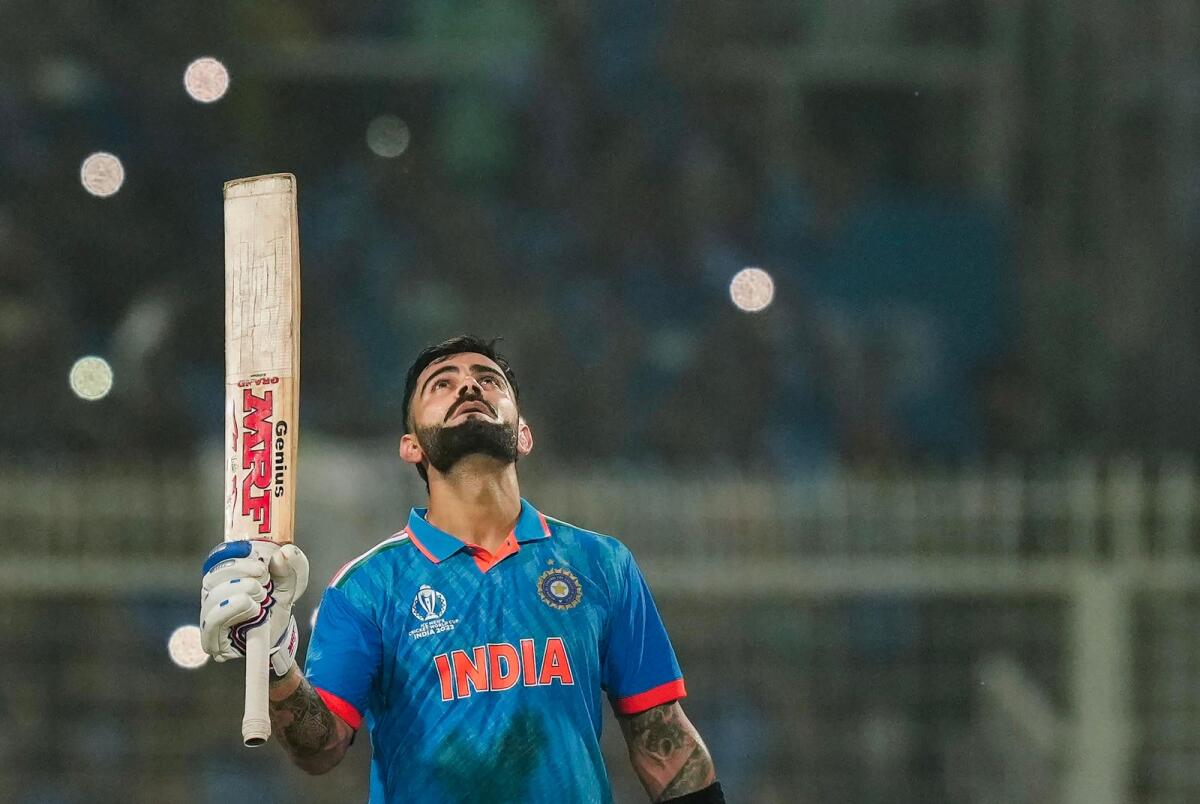 Indian batter Virat Kohli celebrates his century during the ICC Men's Cricket World Cup 2023 match between India and South Africa, at Eden Gardens, in Kolkata, Sunday, Nov. 5, 2023. Photo: PTI