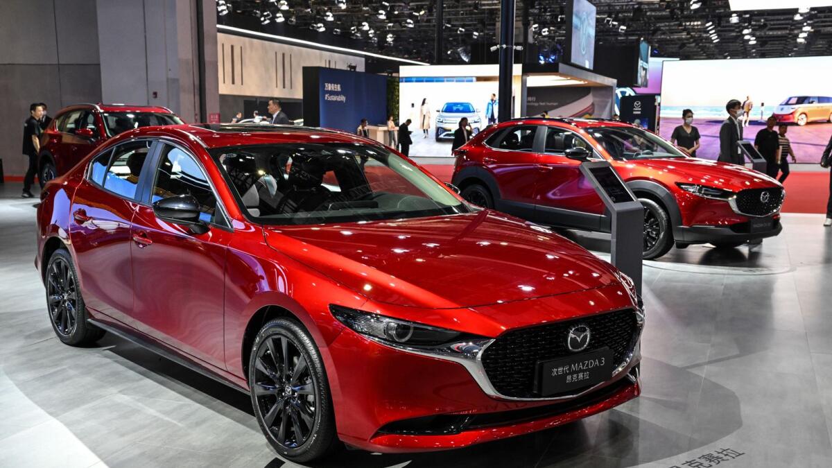 A Mazda 3 car is displayed during the 20th Shanghai International Automobile Industry Exhibition in Shanghai on Thursday. - AFP