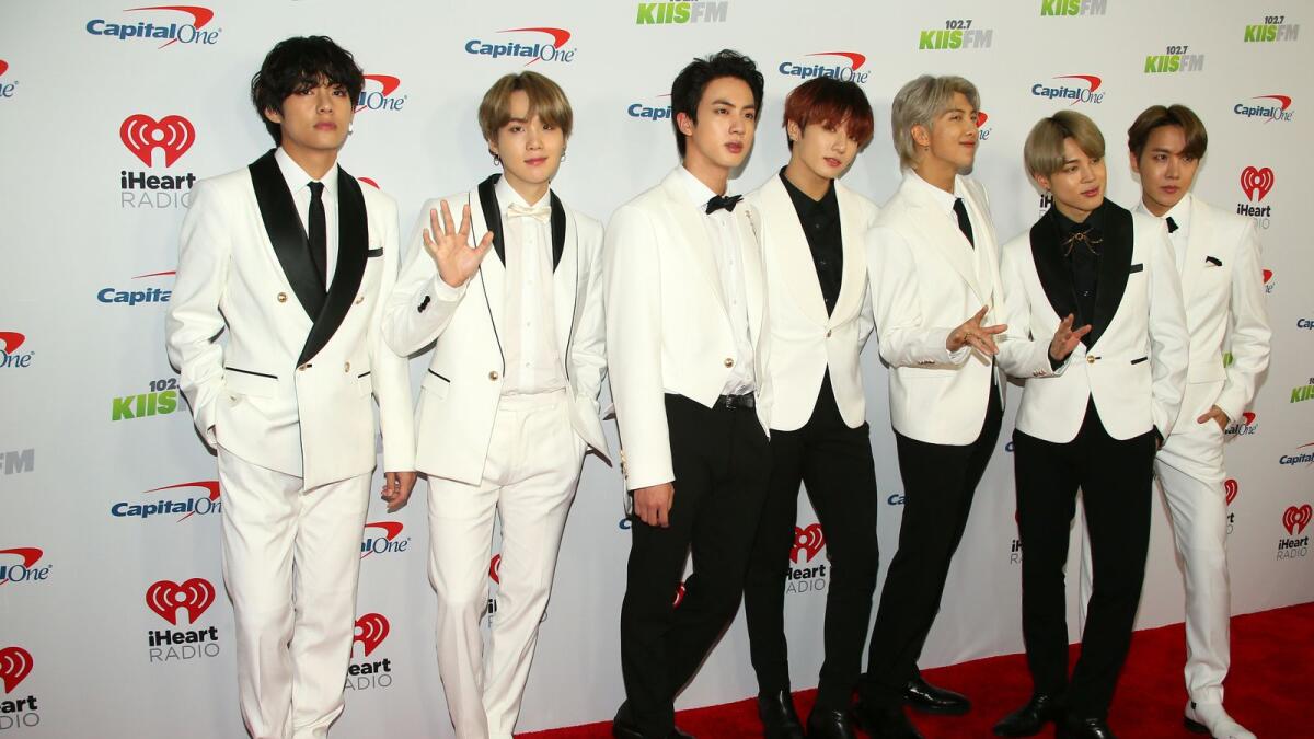 South Korean boy band BTS arrives for the KIIS FM's iHeartRadio Jingle Ball at the Forum Los Angeles in Inglewood, California. Like K-Pop's popularity, the app is also global. Users are based in more than 200 countries. - AFP file