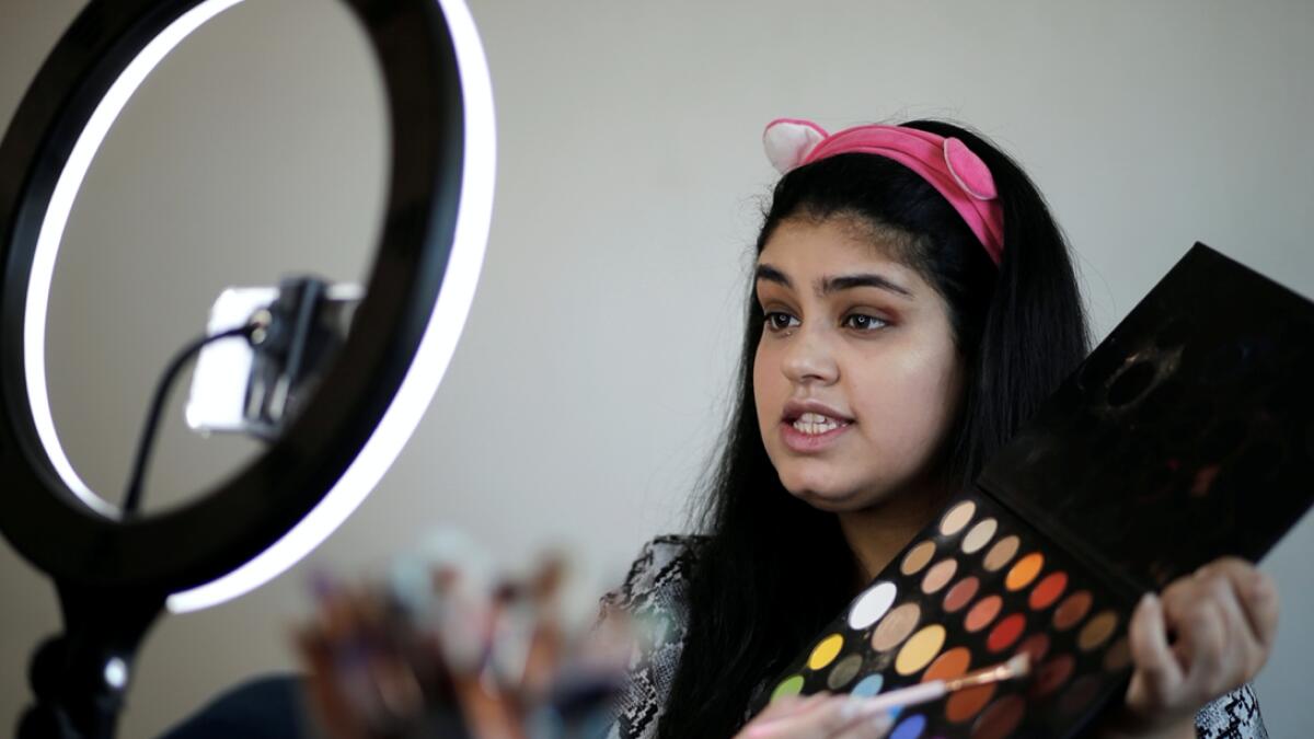 A Bahrain make-up artist, Eman Javeed, gives online make-up classes from her home, following the outbreak of the coronavirus disease (Covid-19), in Isa, Bahrain. Photo: Reuters