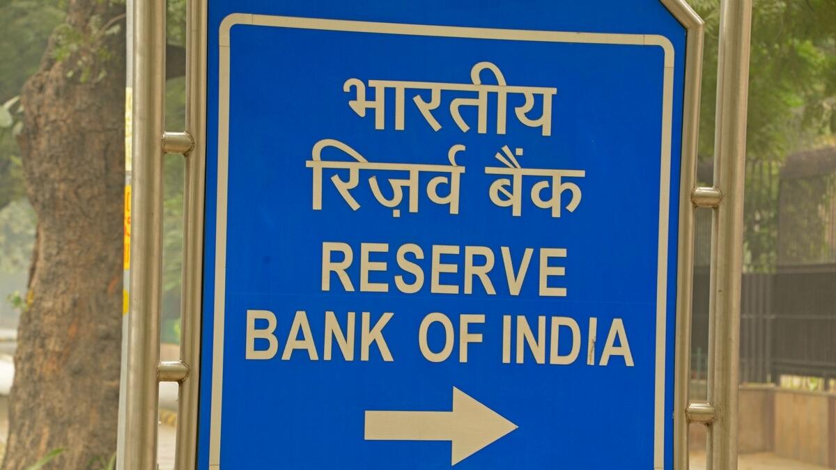 RBI leaves interest rates unchanged, lowers growth forecast