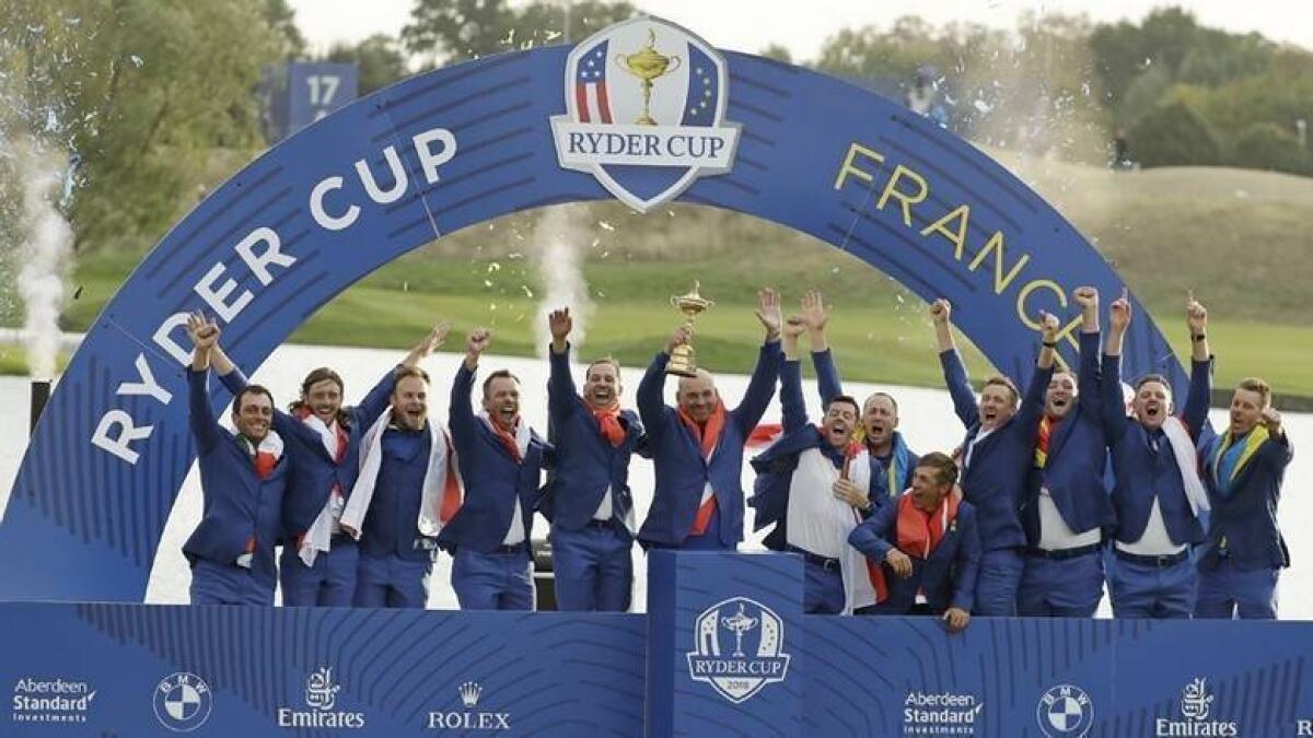 Team Europe captain Thomas Bjorn lifts the trophy as they celebrate after defeating the US to win the 2018 Ryder Cup. - Reuters file