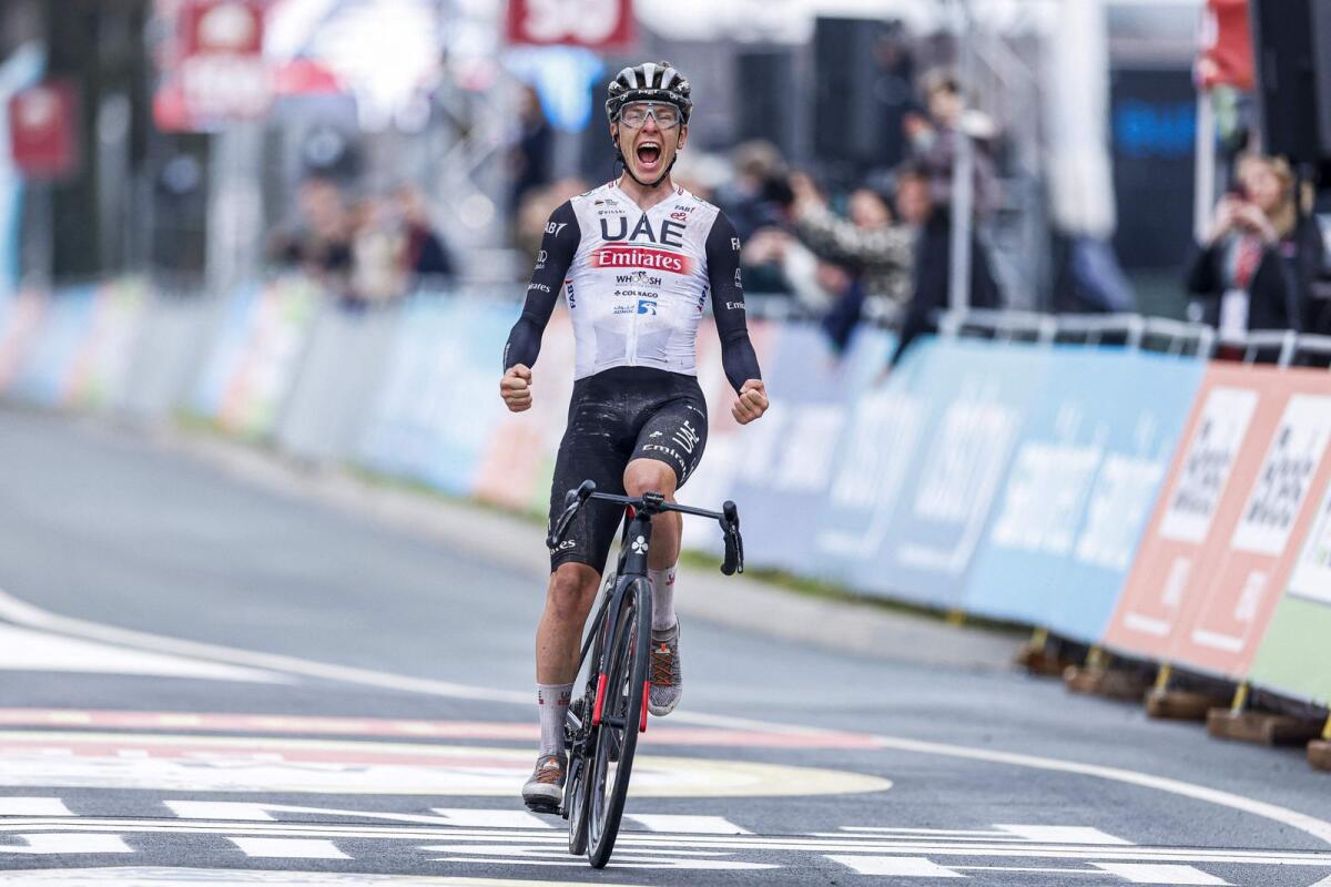 Slovenian cyclist Tadej Pogacar celebrates after winning the Amstel Gold Race. — AFP