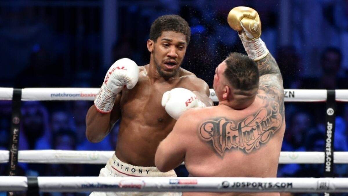 Anthony Joshua's promoter wants to stage his next fight in front of fans. - AFP file