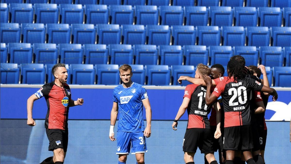 Hertha Berlin players celebrate their first goal against Hoffenheim on Saturday. - Reuters