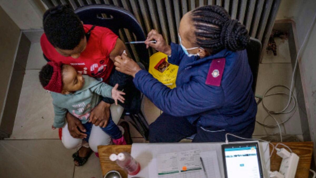 A woman is vaccinated against Covid-19 at the Hillbrow Clinic in Johannesburg. — AP