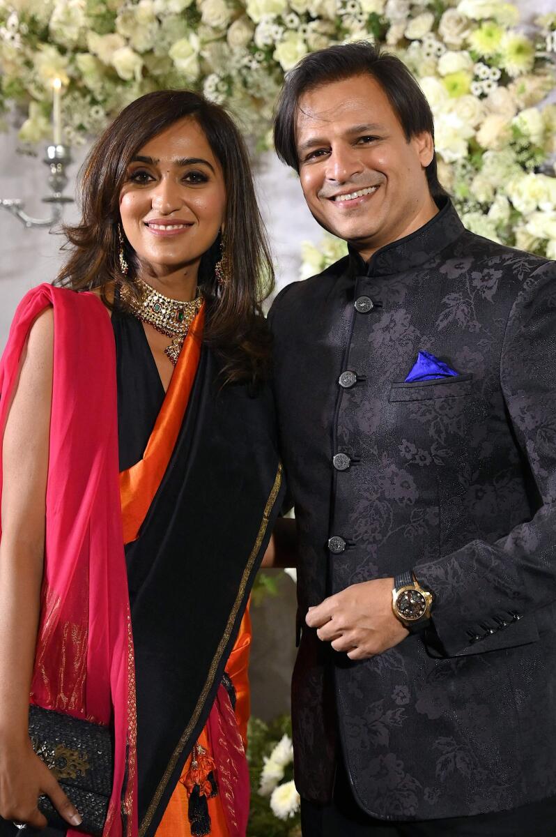 Vivek Oberoi with his fashion forward wife Priyanka Alva who looked gorgeous in an unusual drape sari