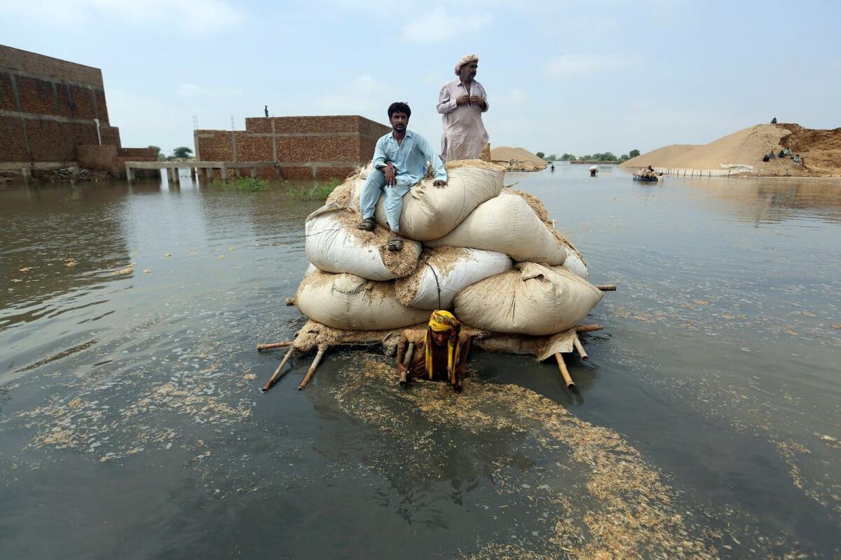 Extreme rainfall in Pakistan affected more than 33 million people this year, with some communities converted into lakes. — AP