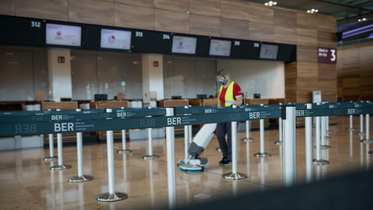 A cleaner at the airport Berlin Brandenburg 'Willy Brandt' (BER) on Thursday.  Berlin's new airport, which will be the only major airport for the Berlin Brandenburg region, is planned to open on October 31, 2020.