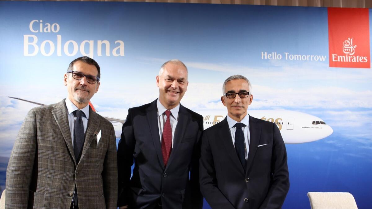 Thierry Antinori, Emirates' Executive Vice President &amp; Chief Commercial Officer (C) is welcomed to Bologna by Virginio Merola, Mayor of Bologna (L) and Enrico Postacchini, Chairman of Bologna Airport (R).