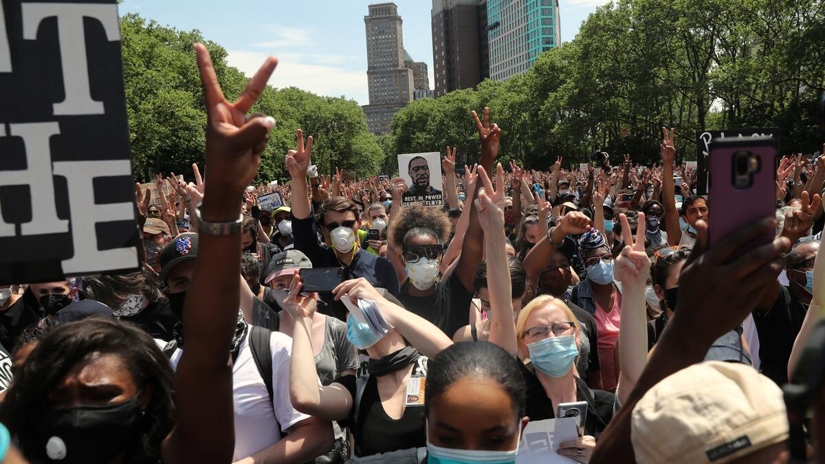 People attend a public memorial after the death in Minneapolis police custody of George Floyd in the Brooklyn borough of New York City, New York, U.S., June 4, 2020