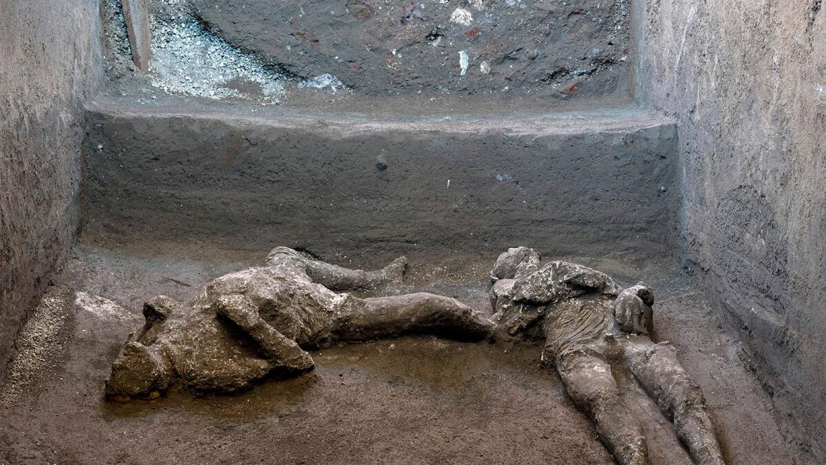 Casts of the bodies of two men, a 40-year-old master and his young slave, after they were found during recent excavations of a Villa in Civita Giuliana in the outskirts of Pompeii, Italy.