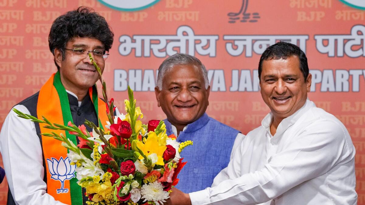 C R Kesavan joins the BJP in the presence of Union Minister V K Singh and party leader Anil Baluni at the party headquarters in New Delhi. — PTI