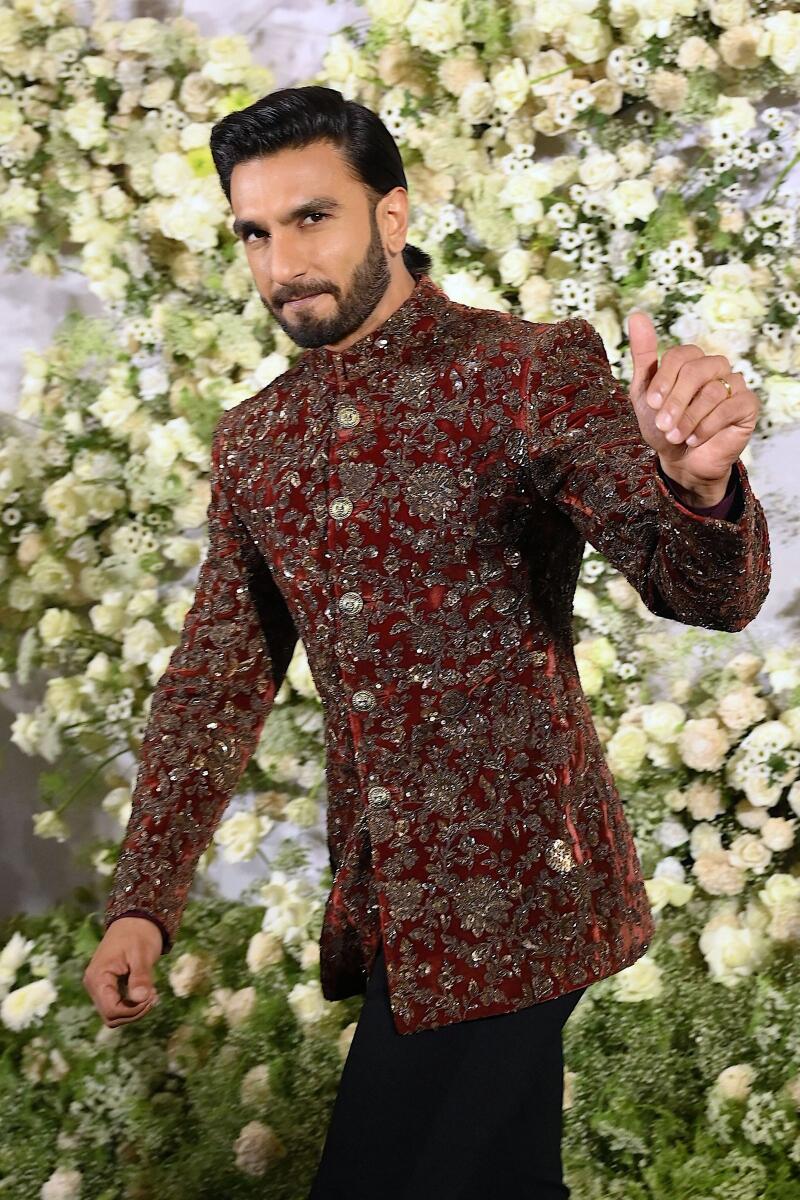 Ranveer Singh made a quick entrance in a festive Sabyasachi jacket paired with tight black pants looking every inch his dapper self.