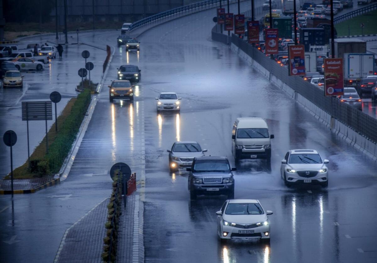 Motorists seen driving through water bodies after heavy rains in UAE. KT Photo: Shihab
