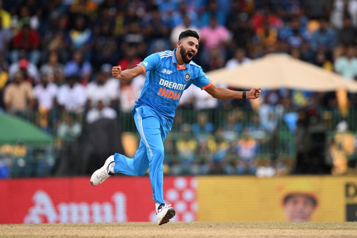 India's Mohammed Siraj celebrates after taking the wicket of Sri Lanka's Dhananjaya de Silva during the Asia Cup final. — AFP