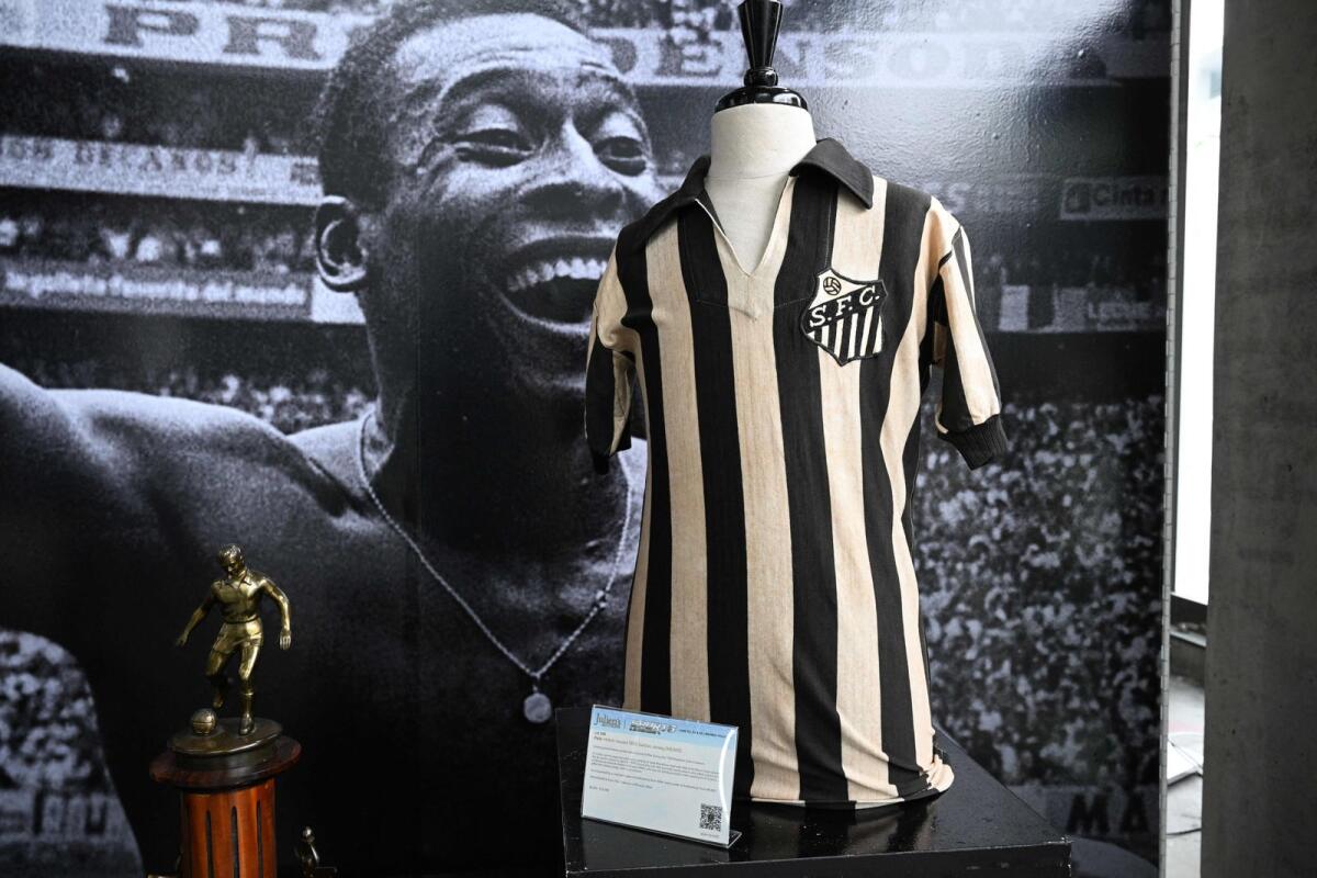 Soccer great Pele match-issued 1956 Santos Jersey is displayed at the media preview for of Julien's 'Sports Legends' auction, June 19, 2023 in Beverly Hills, California. - AFP