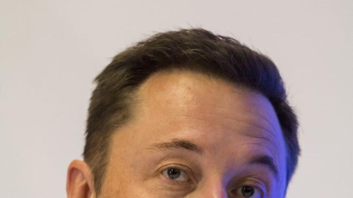 Tesla chief in feud with auto workers union