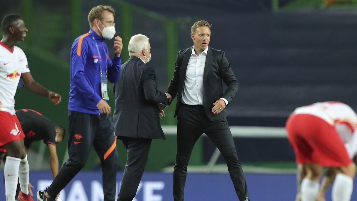 Leipzig's head coach Julian Nagelsmann celebrates after the Champions League quarterfinal victory against Atletico Madrid