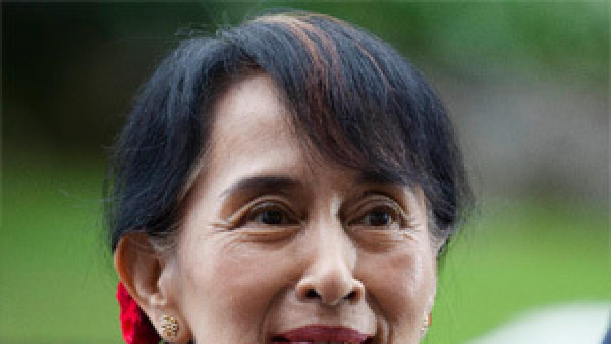 Suu Kyi returns to Britain after 24 years