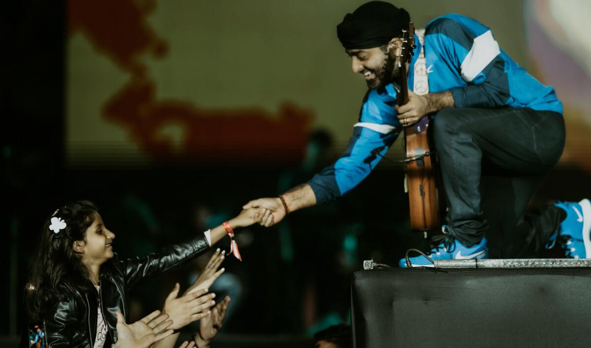 Celebrated Indian singer Arijit Singh during a live concert. — Facebook