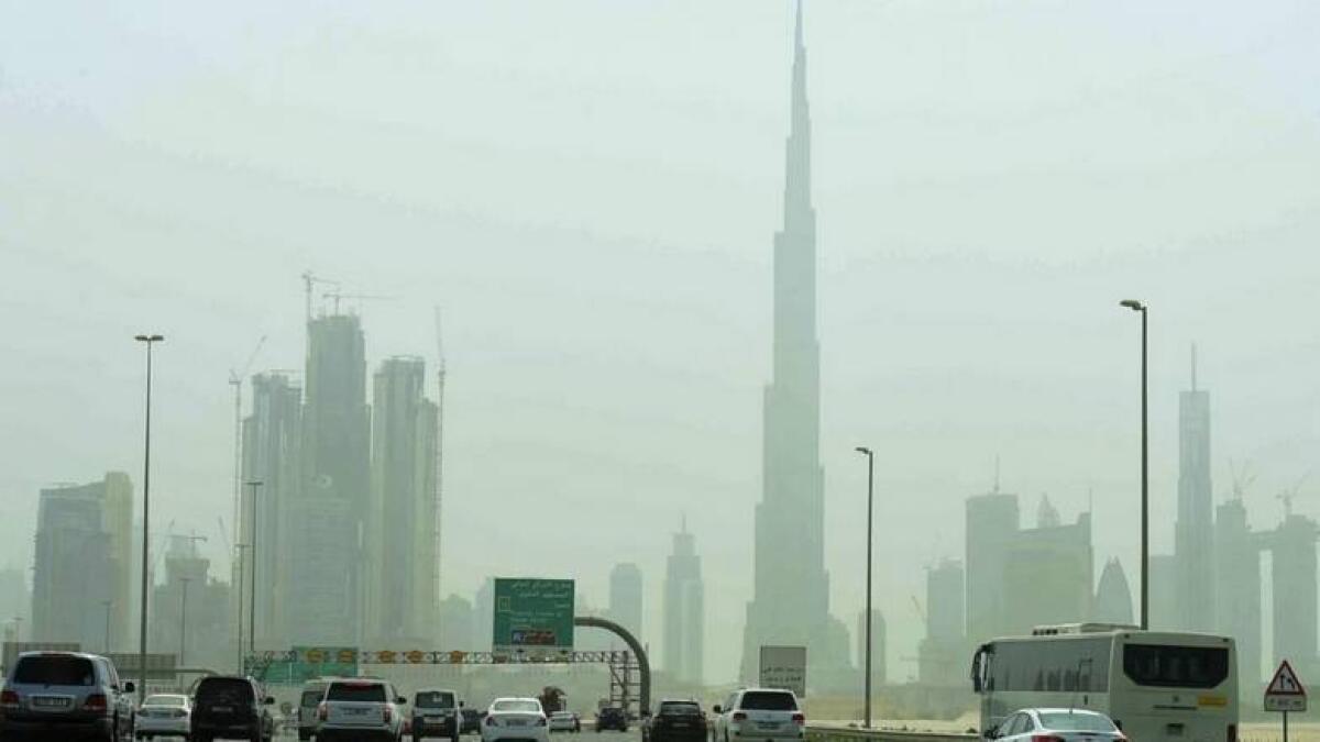 Partly cloudy, dusty, day, UAE, weather, national center of meteorology, dubai, abu dhabi, poor visibility
