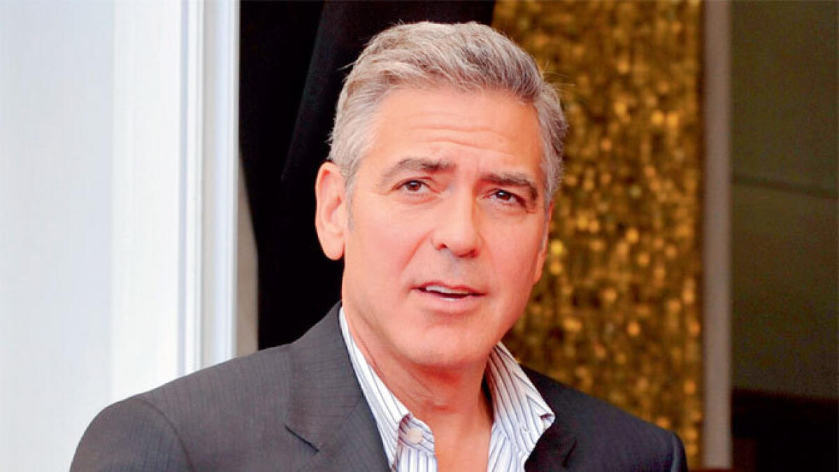 Clooney rips Steve Wynn in defense of Obama