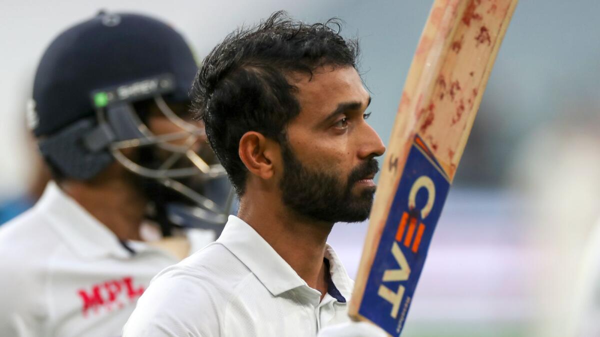 India's Ajinkya Rahane acknowledges the crowd as he leaves the field at the end of second day's play in Melbourne. (AP)