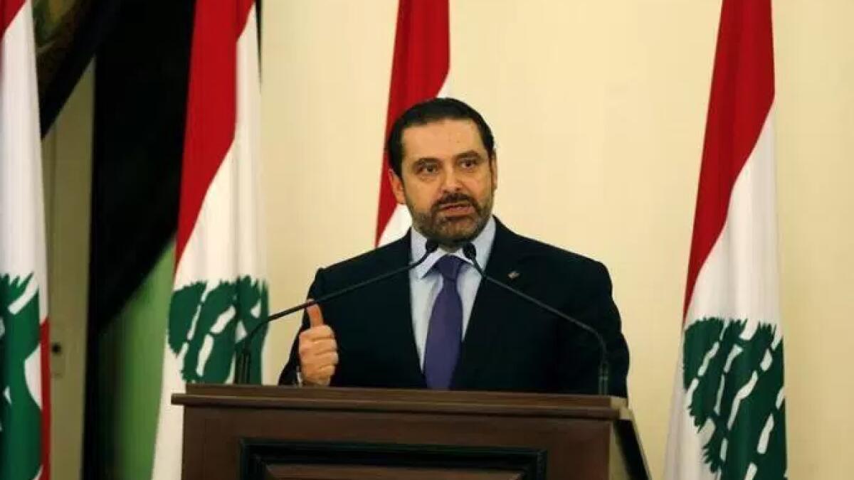 Lebanon PM says free in Saudi, will return home soon