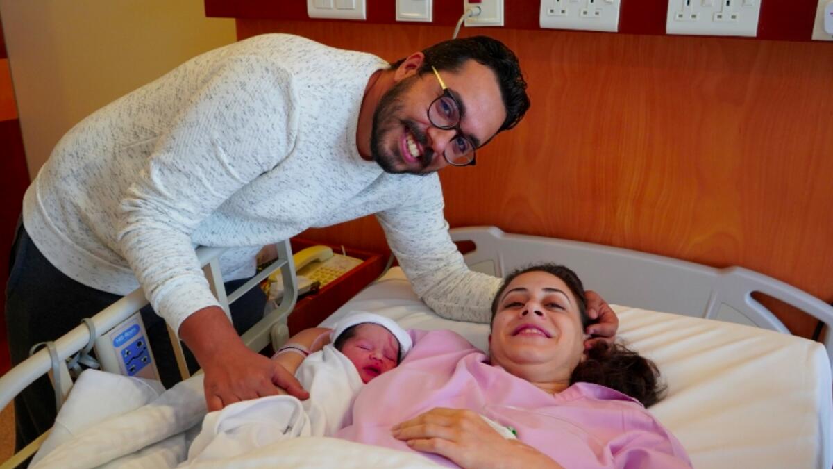 Baby with parents at RAK Hopital