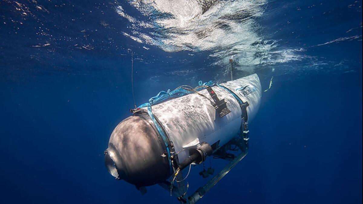 This undated image courtesy of OceanGate Expeditions, shows their Titan submersible beginning a descent. - AFP