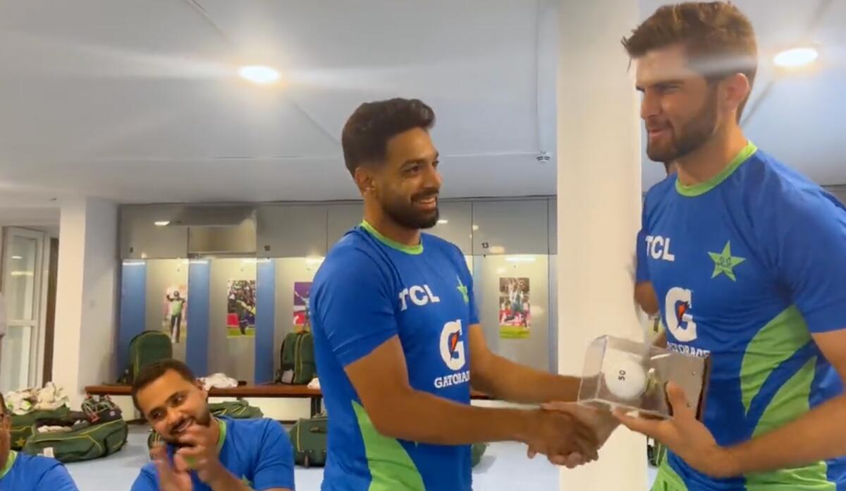 Haris Rauf receives the trophy from Shaheen Afridi in the Pakistan dressing room. — X