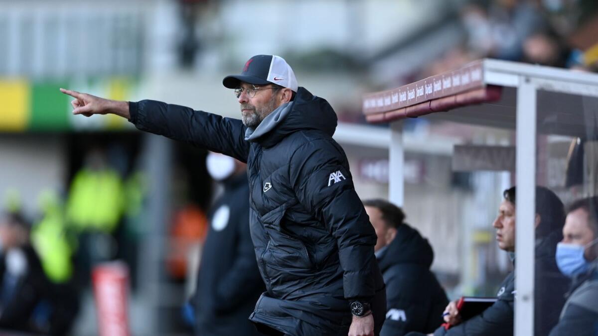 Jurgen Klopp gestures from the bench during a Premier League match against Burnley. — AP