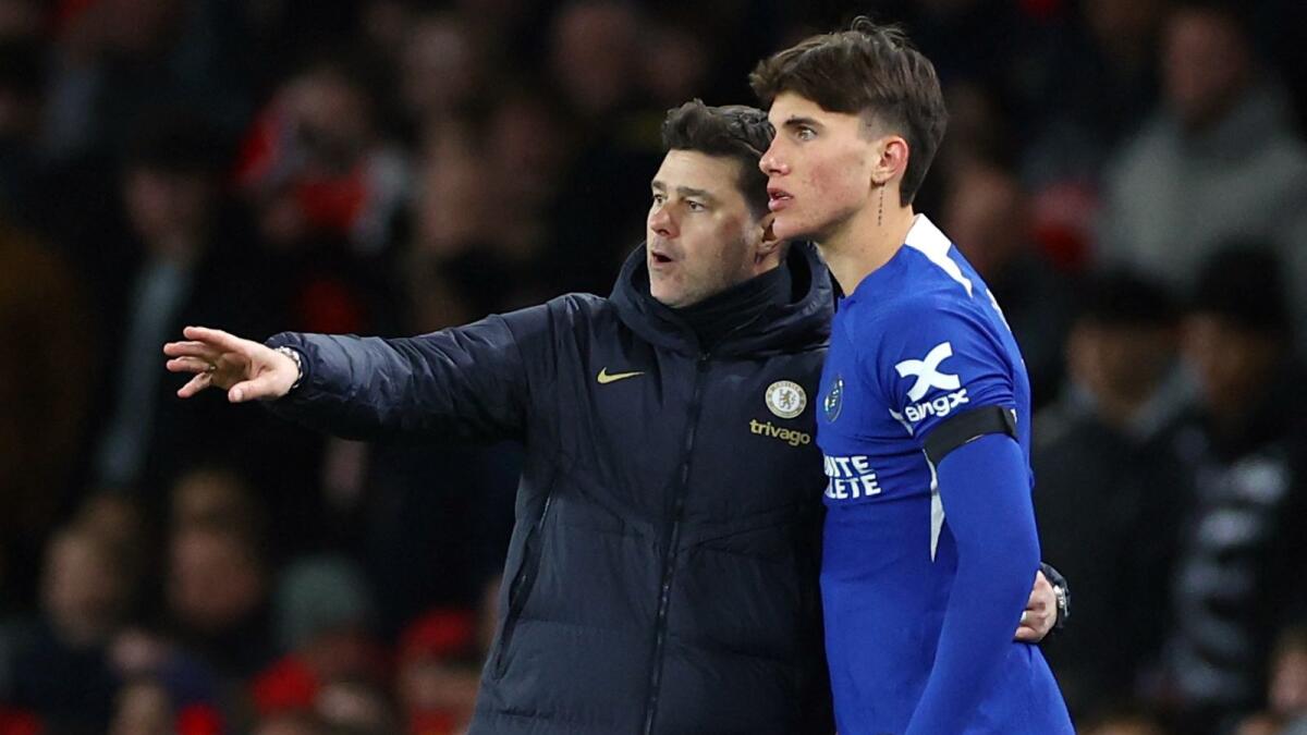 Twenty-one-year-old Chelsea's Cesare Casadei with manager Mauricio Pochettino. - Reuters