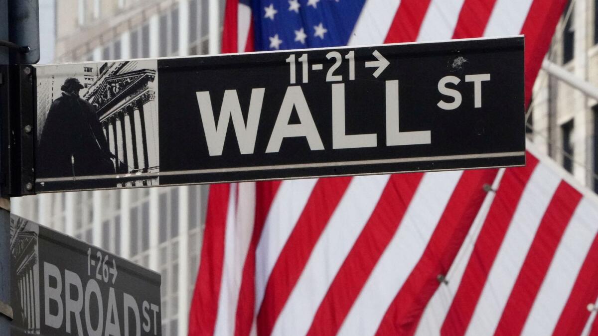 The Wall Street sign is pictured at the New York Stock exchange. — Reuters