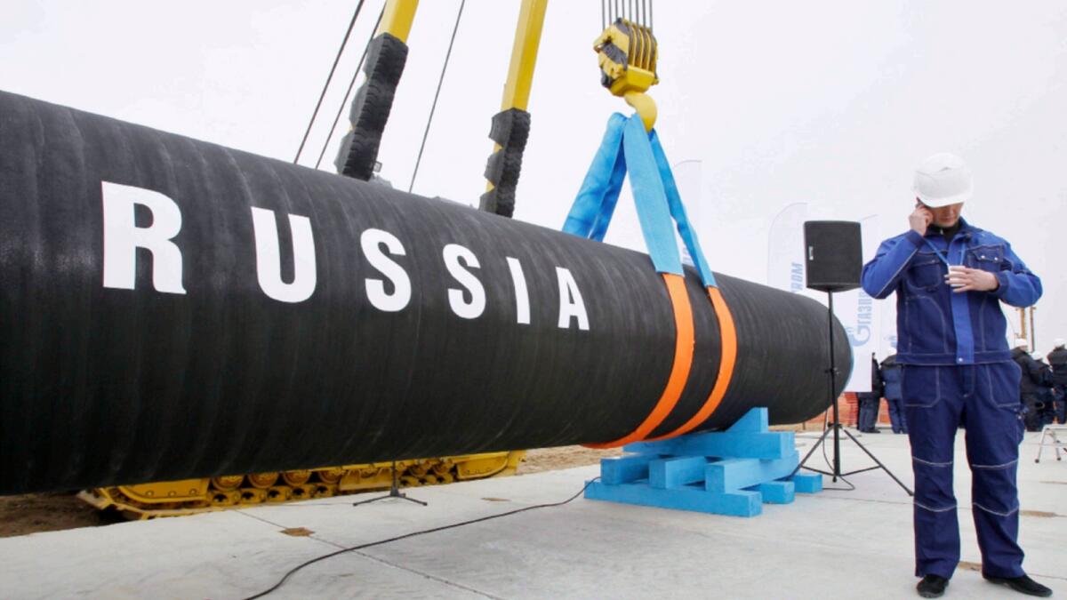 A Russian construction worker near Nord Stream pipeline construction in Portovaya Bay. — AP file