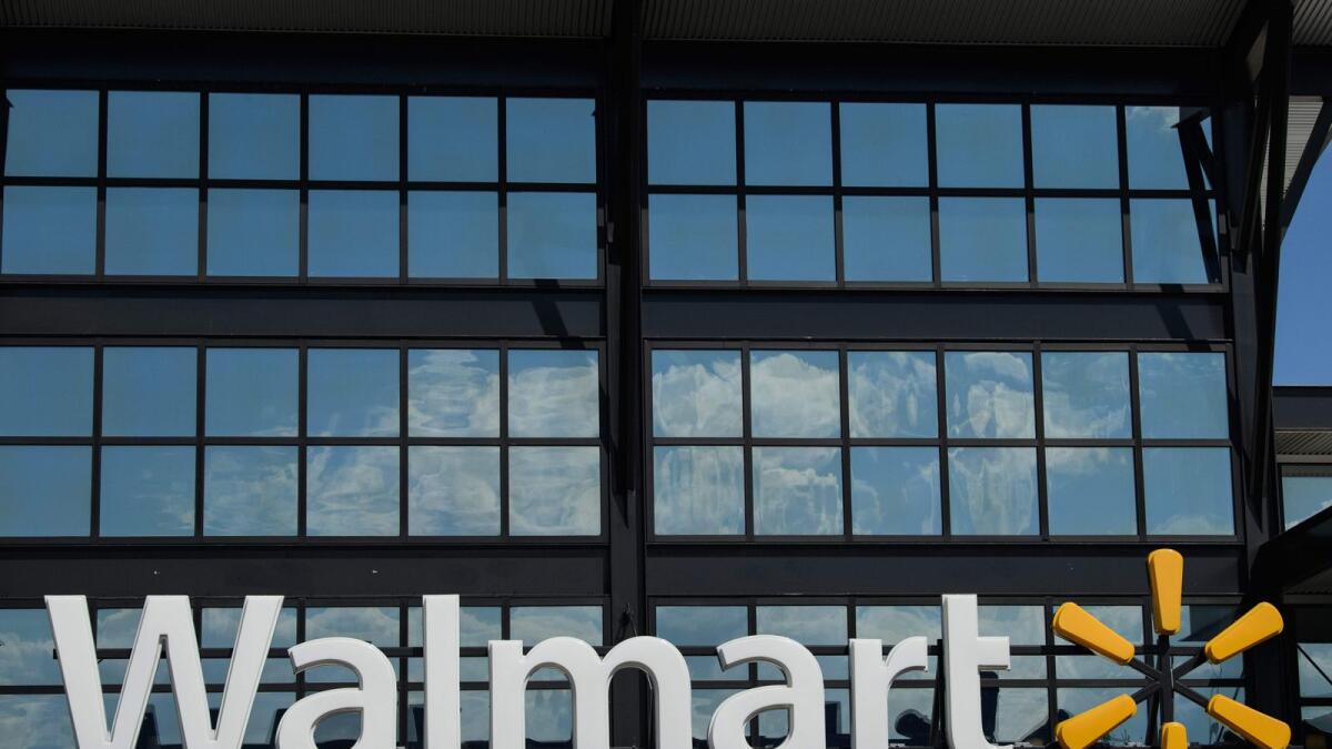 In this file photo taken on August 18, 2020, a Walmart logo is seen outside a store in Washington, DC.